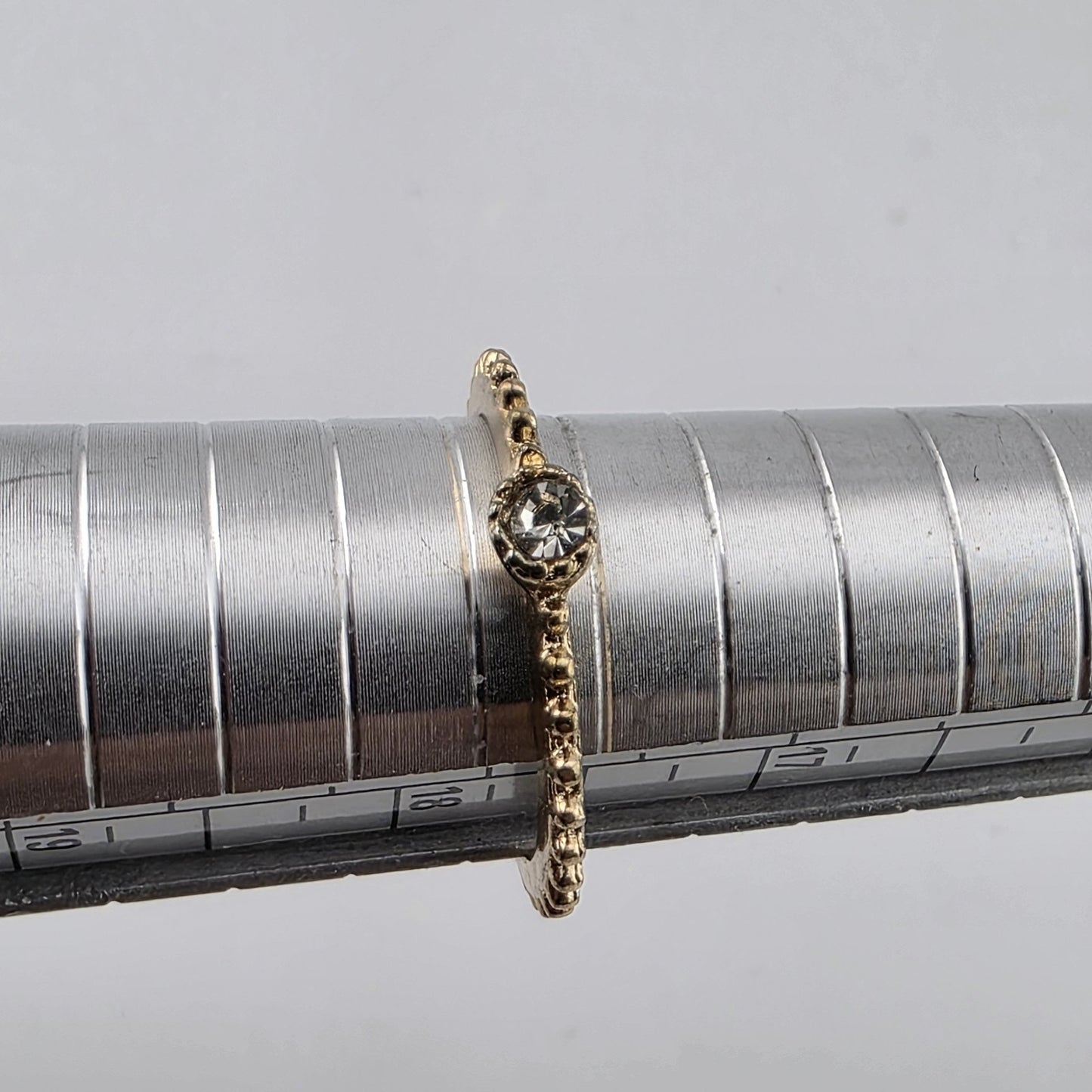 Ring Fashion Dainty Gold Tone Solitaire Clear Stone Textured Stackable Band 7.5