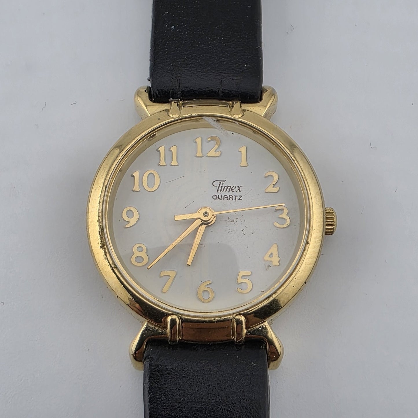 Vintage Timex Quartz Women's Gold Tone Dress Watch Black Strap Runs 6.75 Wrist