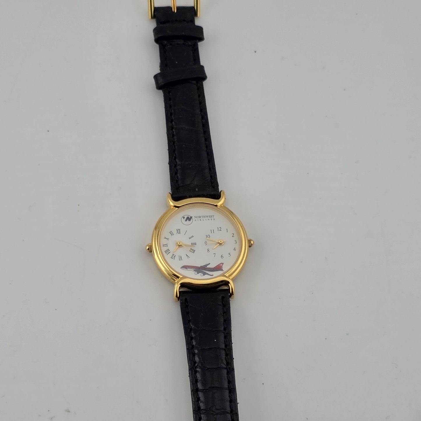 Vintage Northwest Airlines Dual Time Zone Watch Working Gold Tone Black Strap