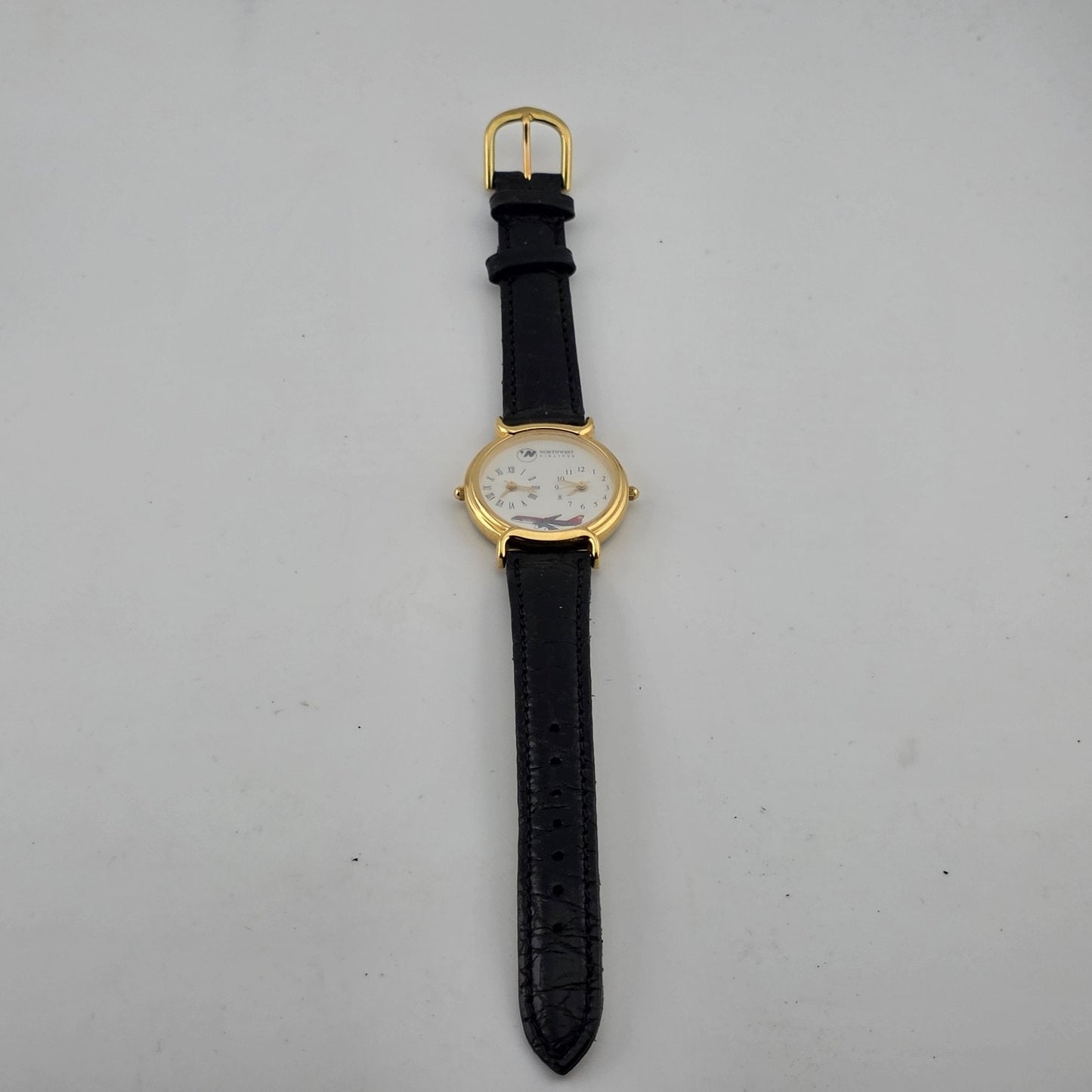 Vintage Northwest Airlines Dual Time Zone Watch Working Gold Tone Black Strap