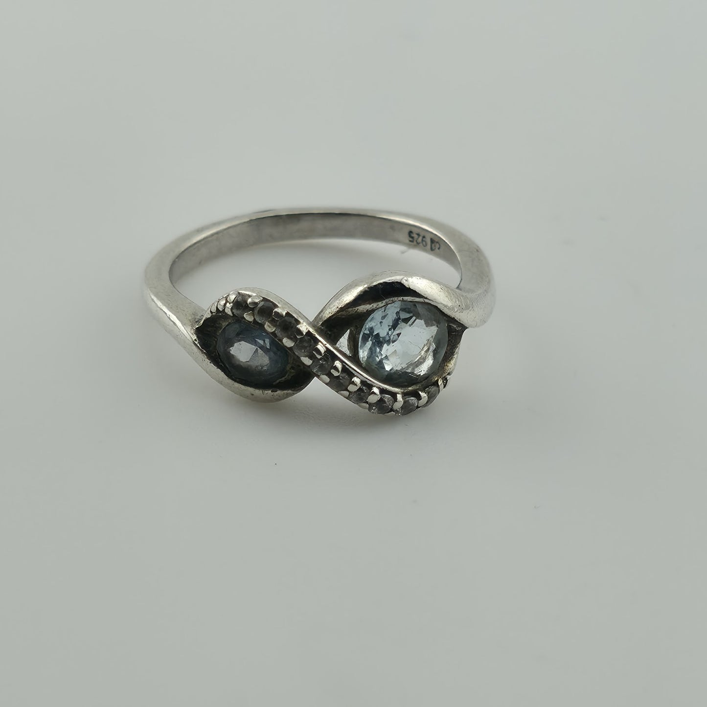 Brilliance 925 Sterling Silver Genuine Blue Topaz White Sapphire Bypass 5.75
